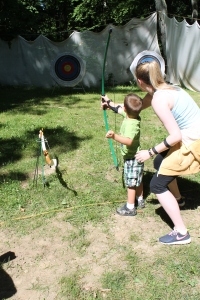 Sawyer and April take aim at the archery range.